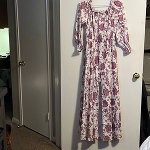 Purple and white romper. Shorts with attached maxi skirt.